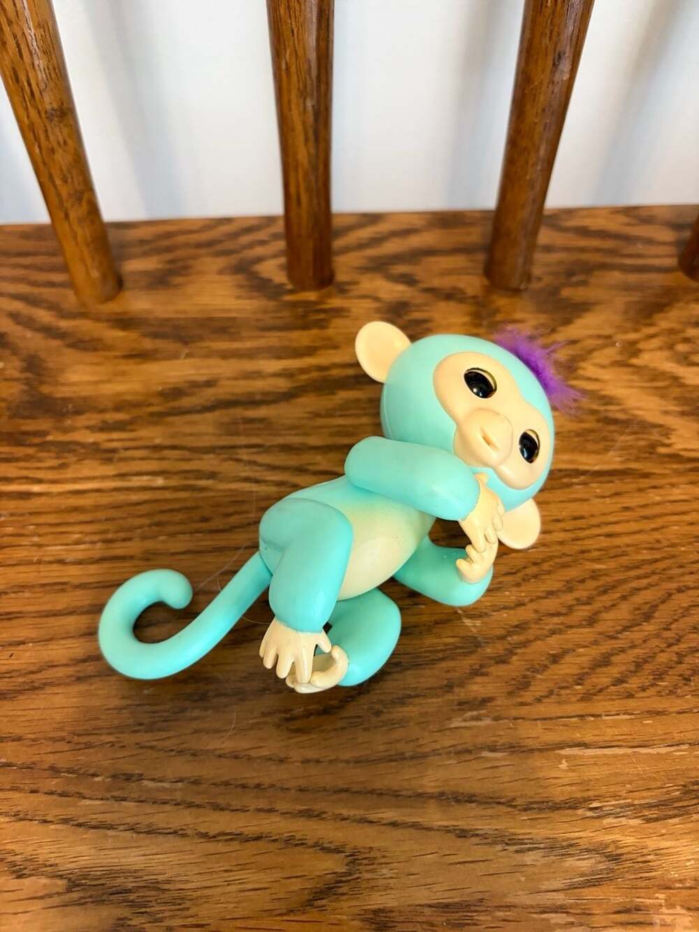 WowWee Fingerlings Interactive Baby Monkey Turquoise with Purple Hair